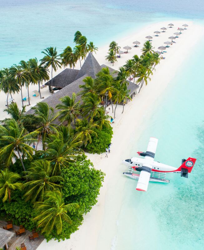 Maldives tropical resort with plane